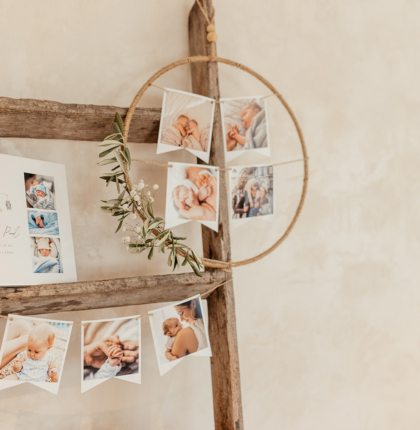 Babyfotos im Blumenkranz, Fotoalbum und Wimpelkette mit Fotos